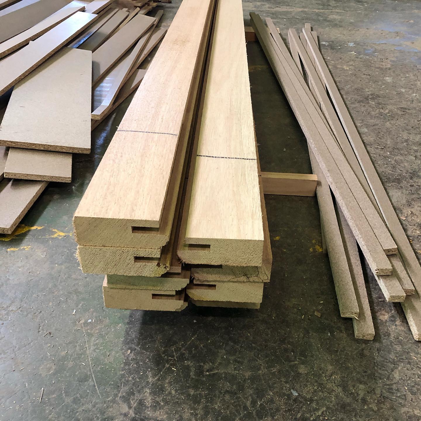 Raw milled timber profiles and offcuts in the workshop