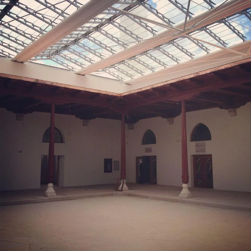 Houghton Mosque courtyard cloistering with timber doors and windows